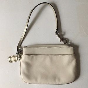 Coach wristlet, cream with silver wrist strap